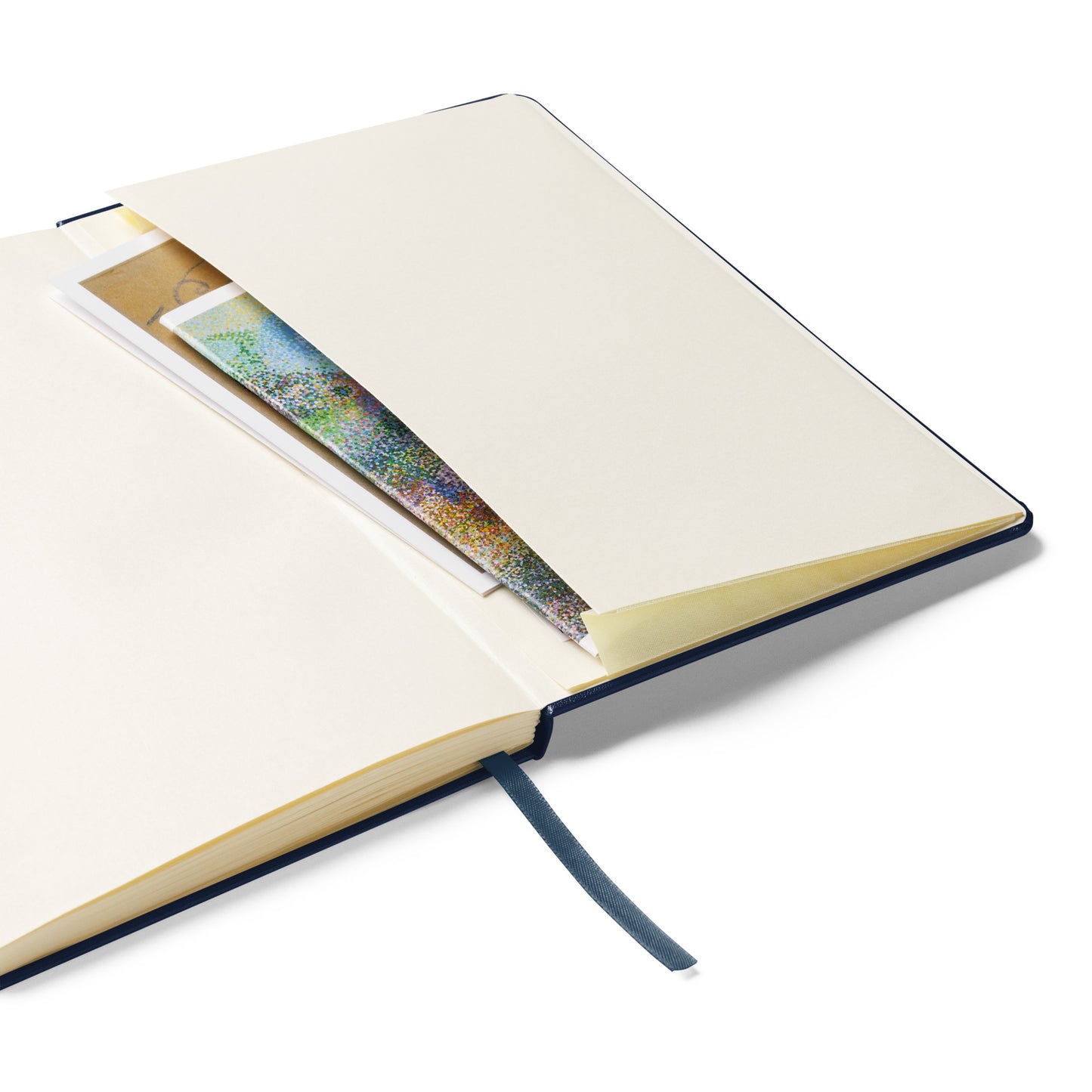 Open Earth Day Everyday Rabbit Hardcover Bound Notebook showing inner pocket with inserted papers and bookmark ribbon