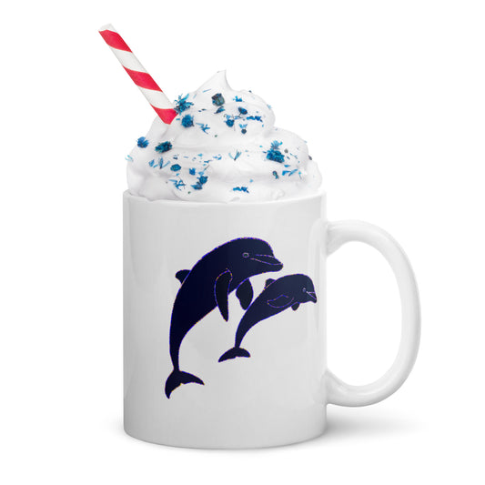 White Dolphins Ceramic Mug with two dolphin illustrations filled with whipped cream and blue sprinkles